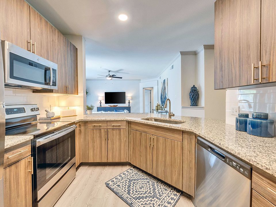 Beautifully remodeled kitchens feature stainless steel appliances
