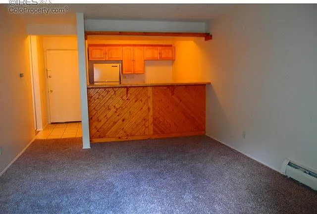 Looking into kitchen from living room