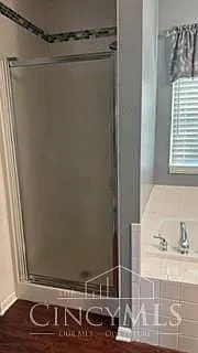 Owner's bath has a separate shower and soaking tub.