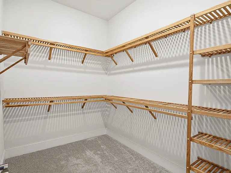 Primary walk-in closet