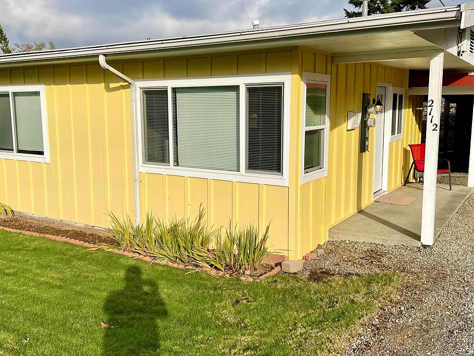 East end of building with covered entry area