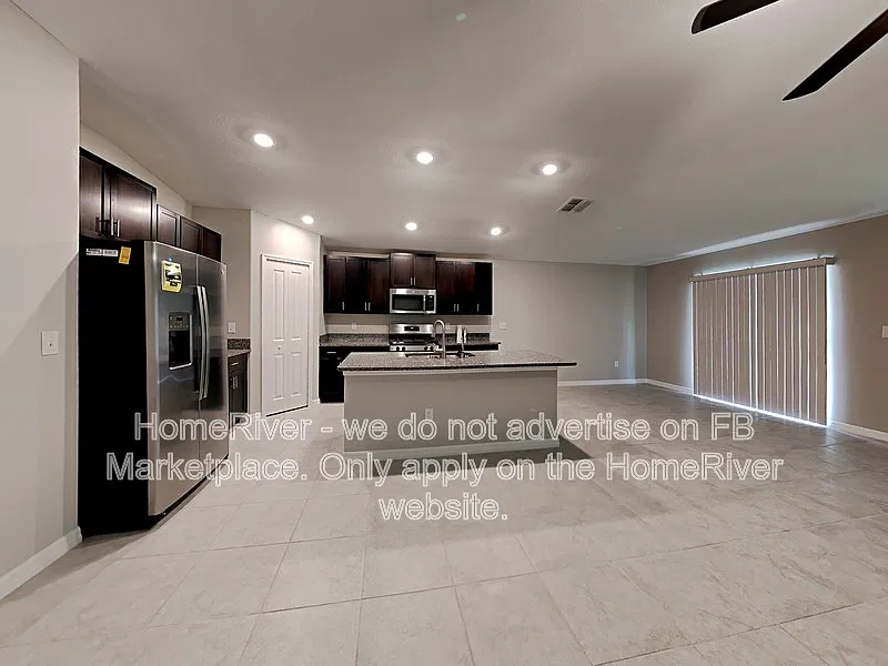 10318 Scarlett Skimmer Dr