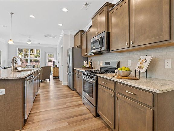 Kitchen has upgraded stainless appliances.