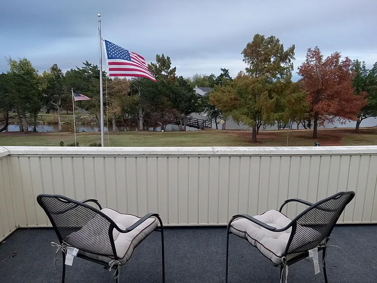 Large deck off master bedroom overlooking lake