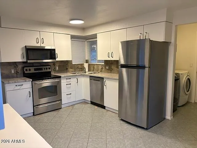 5601 W Carol Ave — Photo 3