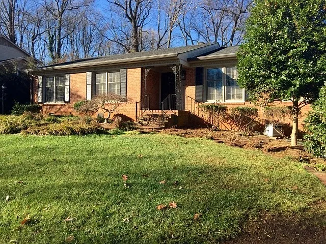 Spacious Brick Ranch w/Finished Basement in Grimsley District — Photo 1