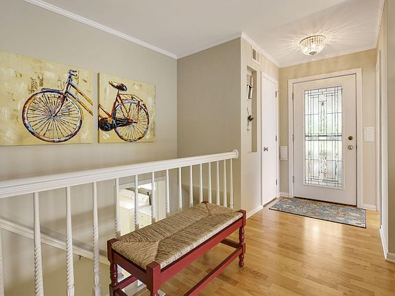 Bright front entry has a roomy coat closet.