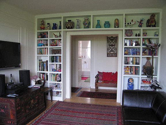 Living area with built in book shelves