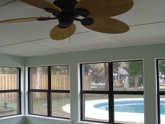 Sunroom and View to Pool