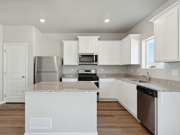 The kitchen of the Rio Grande has beautiful white cabinets.