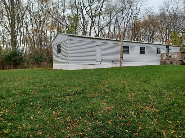 1215 Peterson Rd, Osseo, MI 49266