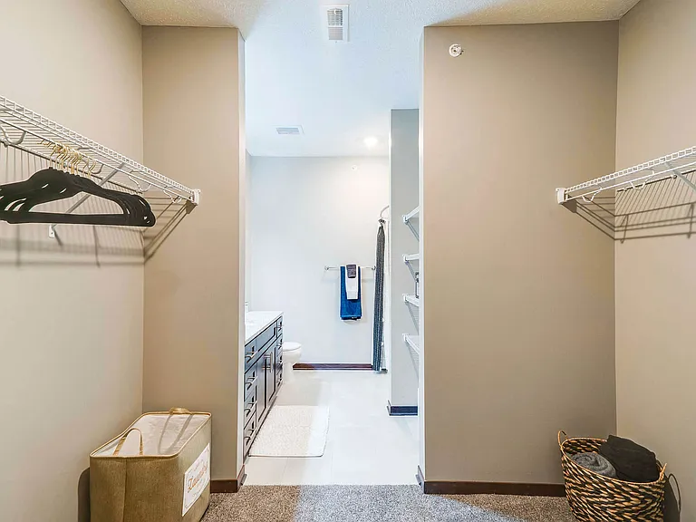 Large walk-in closets offer plenty of space to keep your wardrobe organized.