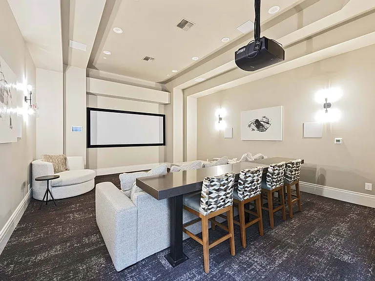 Kick back and enjoy your favorite films in a cozy, theater-style movie room