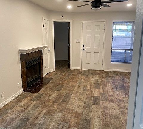 Wood fireplace, tile floors