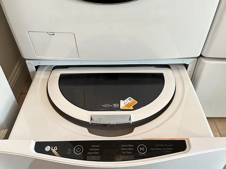 Extra washer in the lower drawer for tiny loads :)
