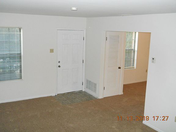 Spacious 12'6" x 17'8" Living Room (view from stairway to 2nd floor)