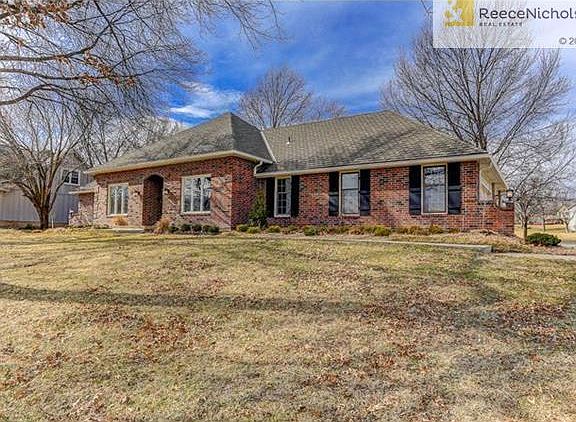 All brick story and a half on estate size lot in beautiful Lakewood!  Completely redone.