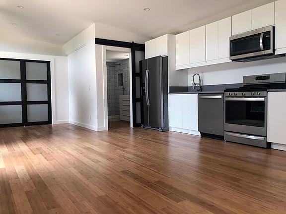 BAMBOO FLOORING. 36" REFRIGERATOR. 24" DISHWASHER. 30" MICROWAVE VENTILATION. 30" GAS OVEN