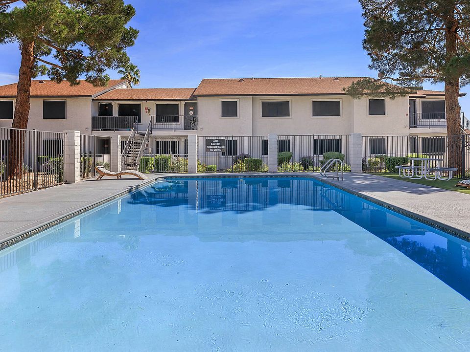Relax by the sparkling pool in this charming community setting.