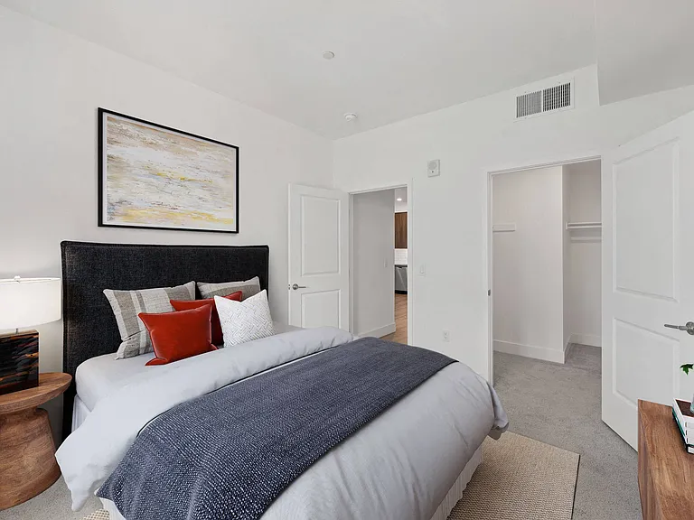 Unwind in spacious bedrooms featuring generous en-suite closets for all your storage needs.
