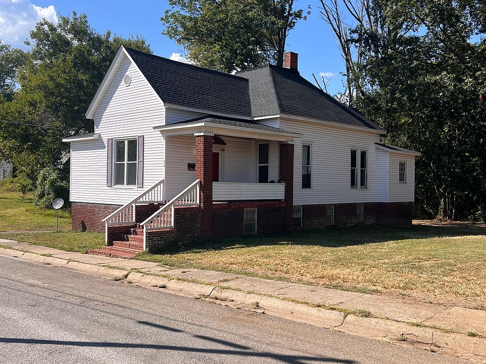 Outside of house, includes one car attached garage
