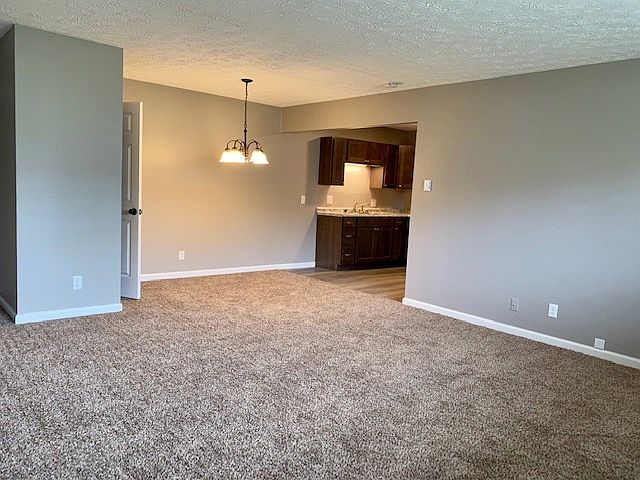 These photos are of the renovated units. The unit available is not renovated.
