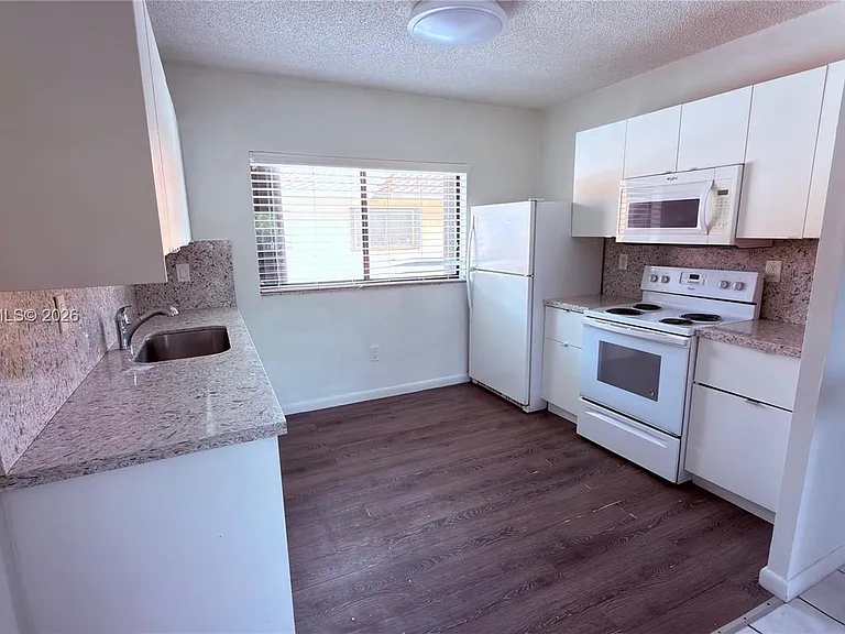 6370 W 27th Ct #203 — Photo 1