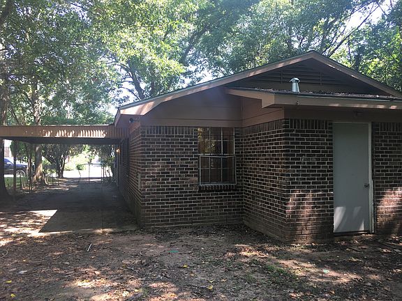 Carport and rear of house