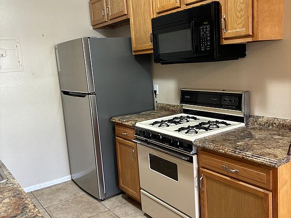 Microwave, stove/oven combo & refrigerator