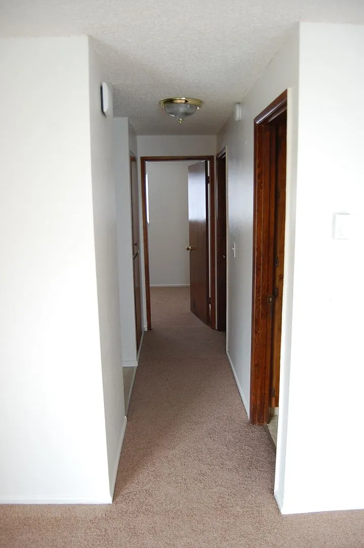 Spacious One & Two Bed Units in a Quite complex with Porches and Covered Off Street Parking — Photo 4