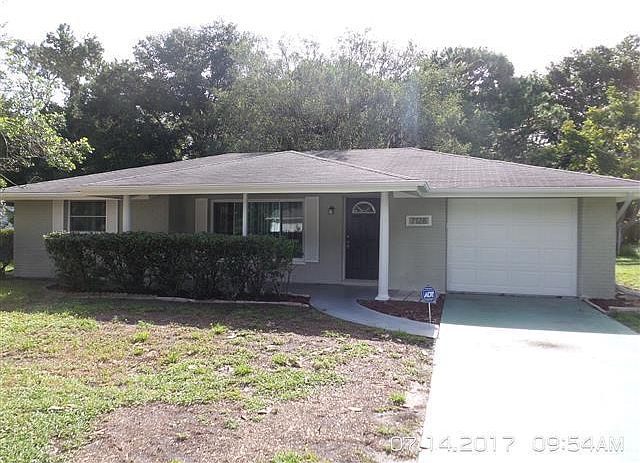 REMODELED 3/2/1/ - 1,300SF. COVERED FRONT PORCH
