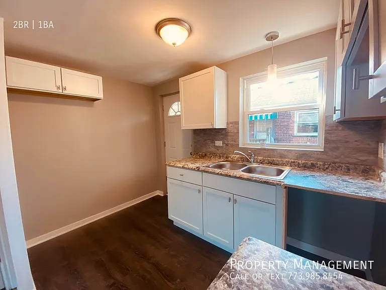 8153 S Colfax Ave — Photo 3