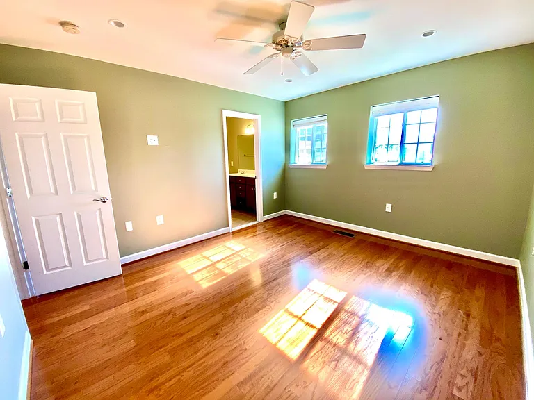Master bedroom with master bathroom and walk-in closet.