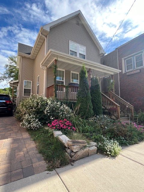 Home with driveway on the left.