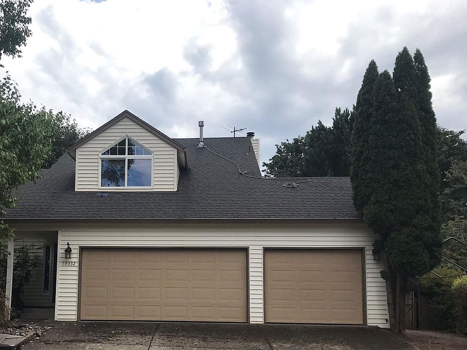 Front of House and 3 Car Garage