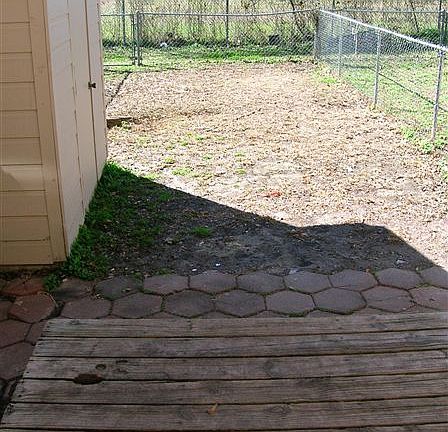 nice back yard and shed. 806 Navidad has wood fence, not qui