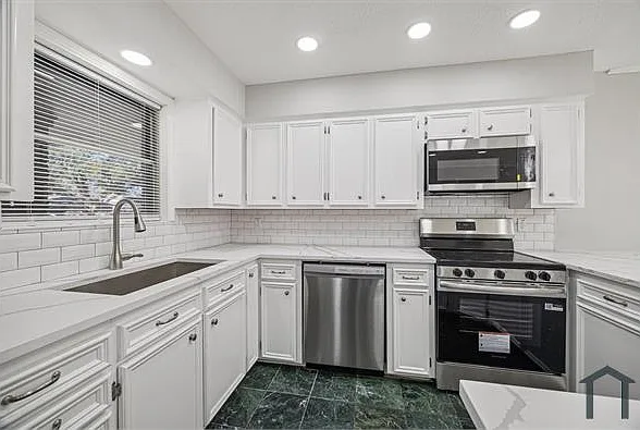 1703 Raintree St — Photo 7