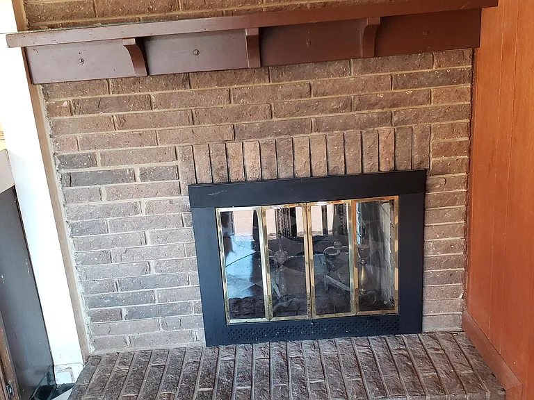 Kitchen side of Living room fireplace