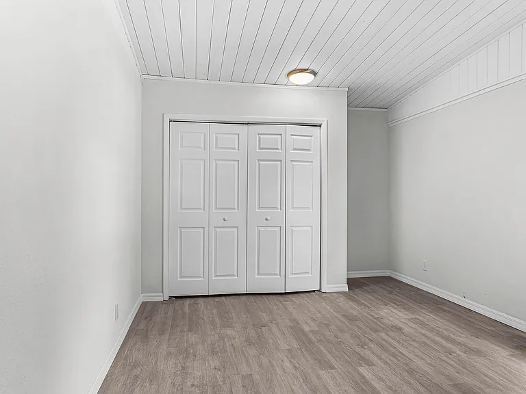 Bedroom 1 (garage conversion) with closet