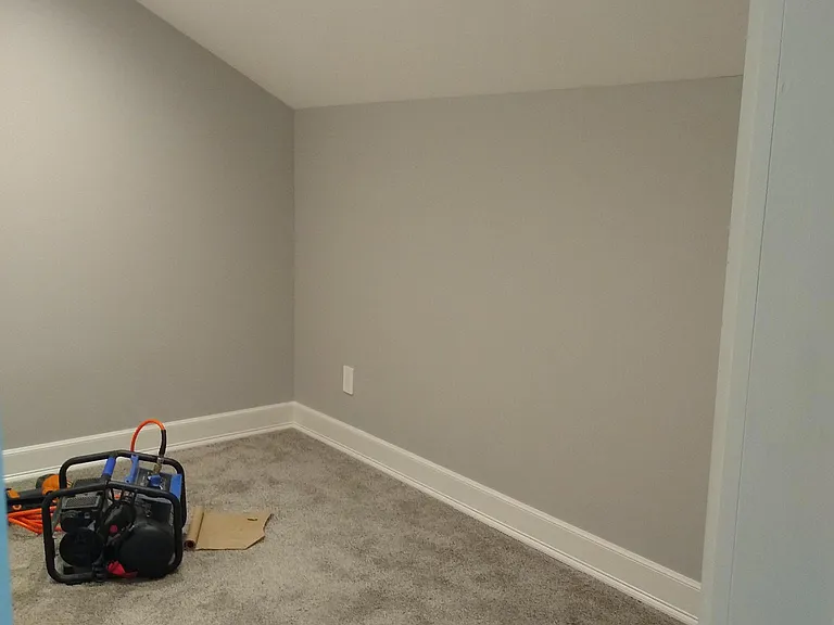 Upstairs bedroom #closet (clothes poles and shoe tower being installed on far wall)