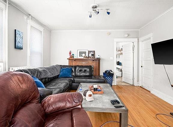 View from bedroom (currently used as living room) to kitchen