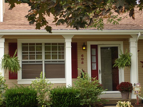 freshly painted trim, shutters & doors
