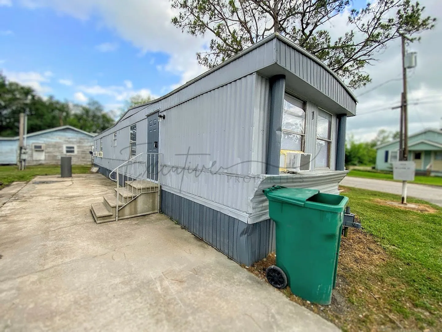3-Bed Mobile Home | Water, Trash & Lawn Care Included! — Photo 1