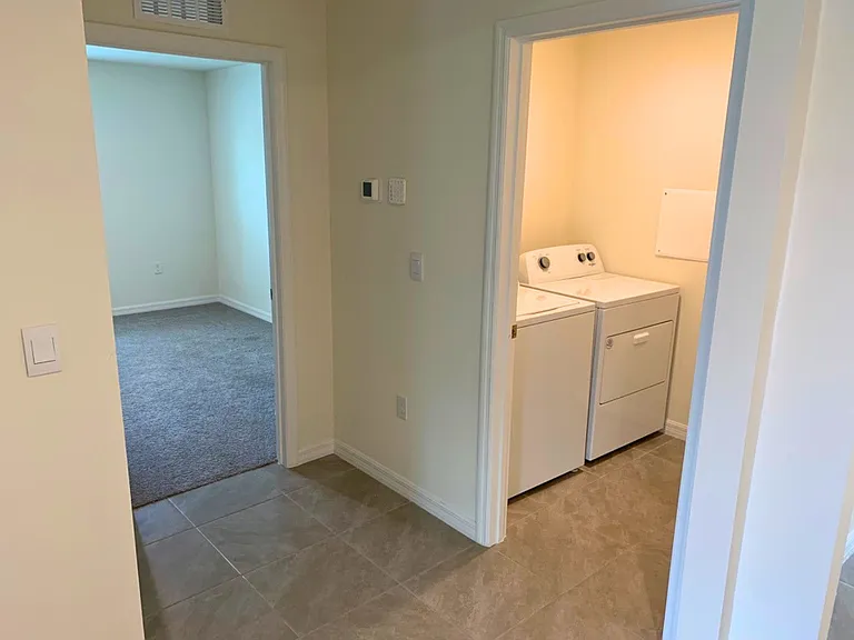 Third Bedroom and Laundry Room