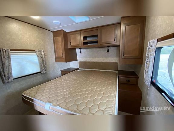 Queen bed with under storage, 2 shirt closets with usb charger/ports, nightstands, and electric.