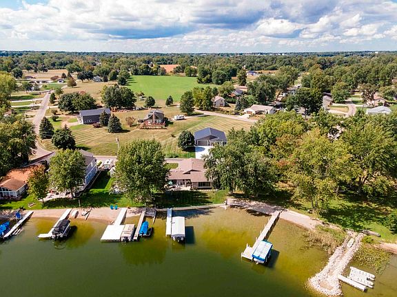 1.31 Acre property with lakefront 3bed 2.5 bath home & 2500 sq ft Pole Barn