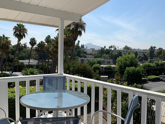 One of the large balconies. Lovely for meals and plenty of room for yoga. Mt. Helix in the distance