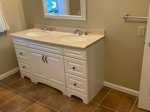 Double vanity in main bath with heated floors
