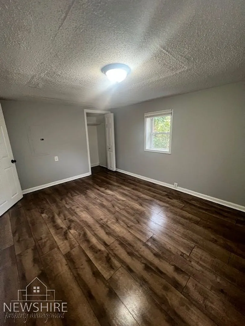 Charming 2BR Home with Large Front Porch & Spacious Kitchen — Photo 3