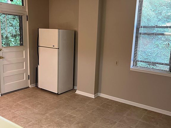 Kitchen Right with Passage Door to Private Deck